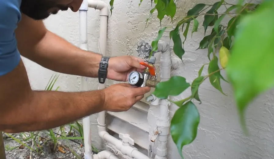 Pressure gauge on an outdoor hose bib